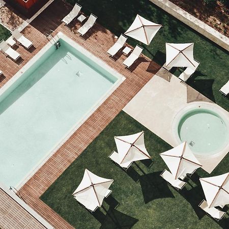 The Editory By The Sea Troia Comporta Hotel מראה חיצוני תמונה Aerial view of the pool at the Hotel